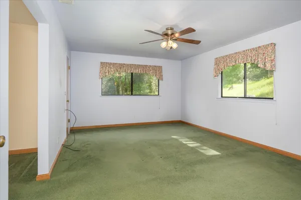 an empty room with windows