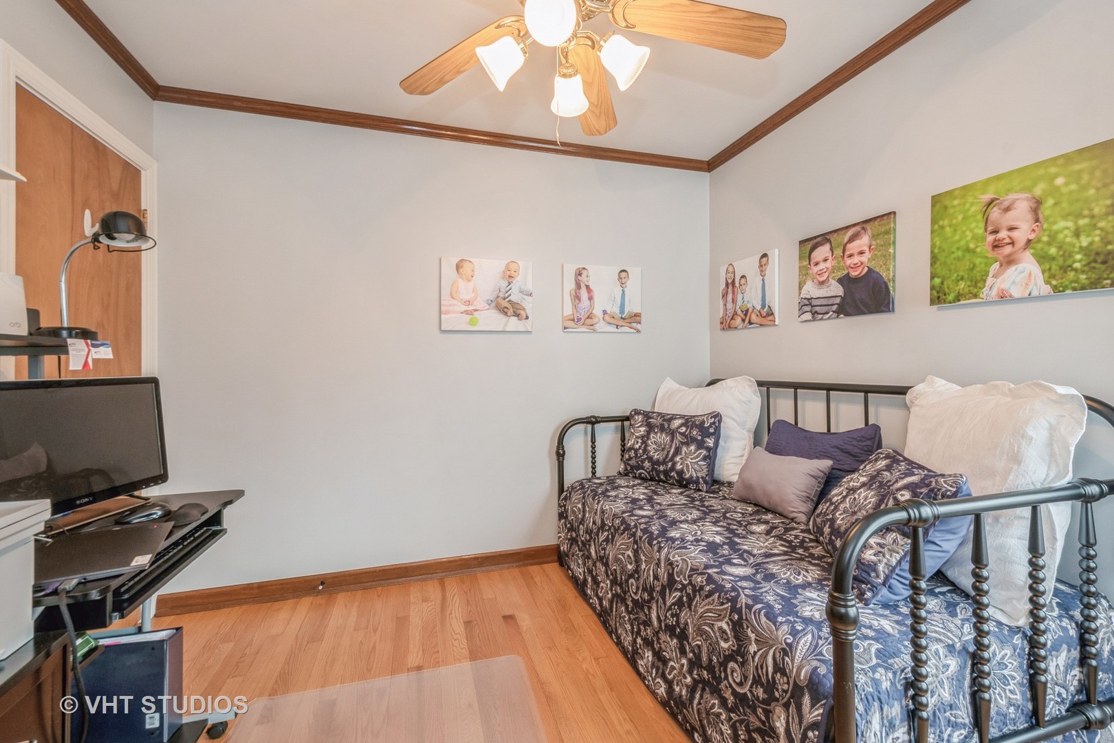 697 Greenview Avenue Des Plaines, IL 60016 - Photo 12 of 25 a living room with furniture a flat screen tv and a window