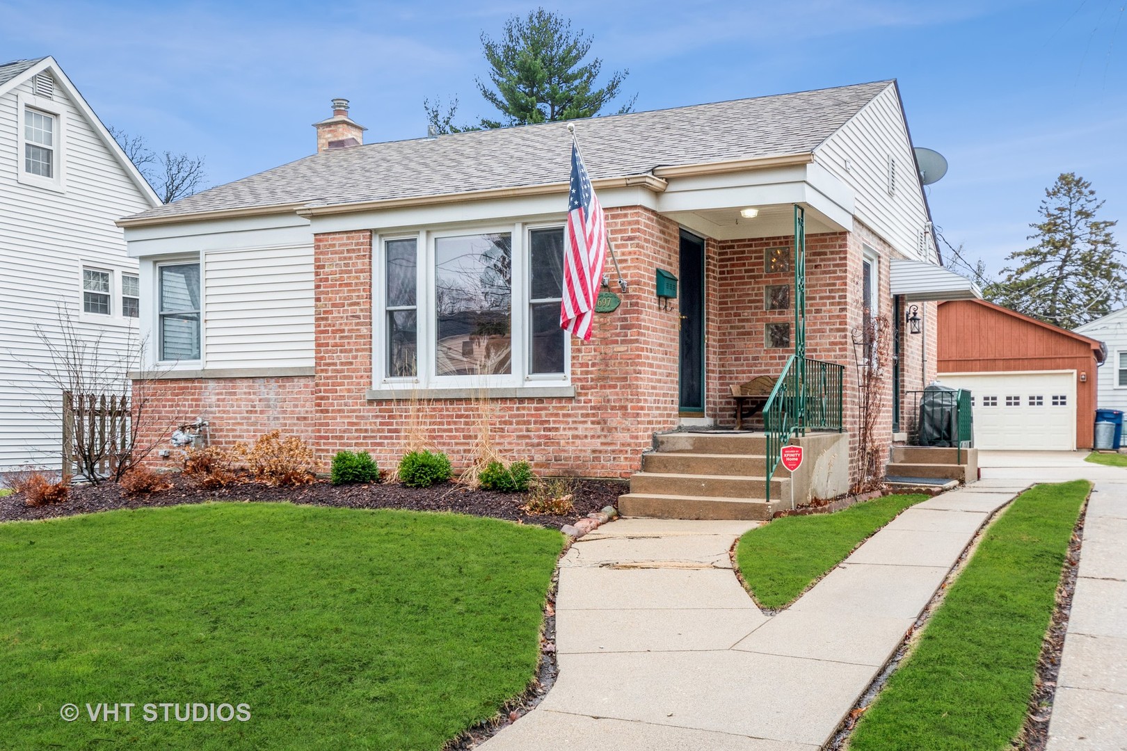 697 Greenview Avenue Des Plaines, IL 60016 - Photo 2 of 25 a front view of a house with a yard