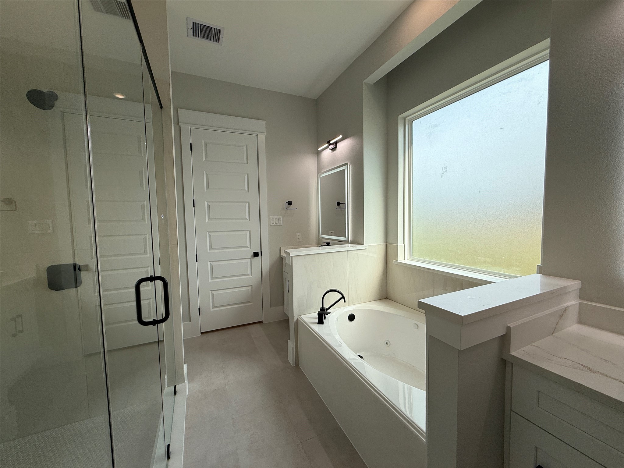 1208 Quarter Horse Trail Angleton, TX 77515 - Photo 13 of 23 a bathroom with a tub sink and mirror