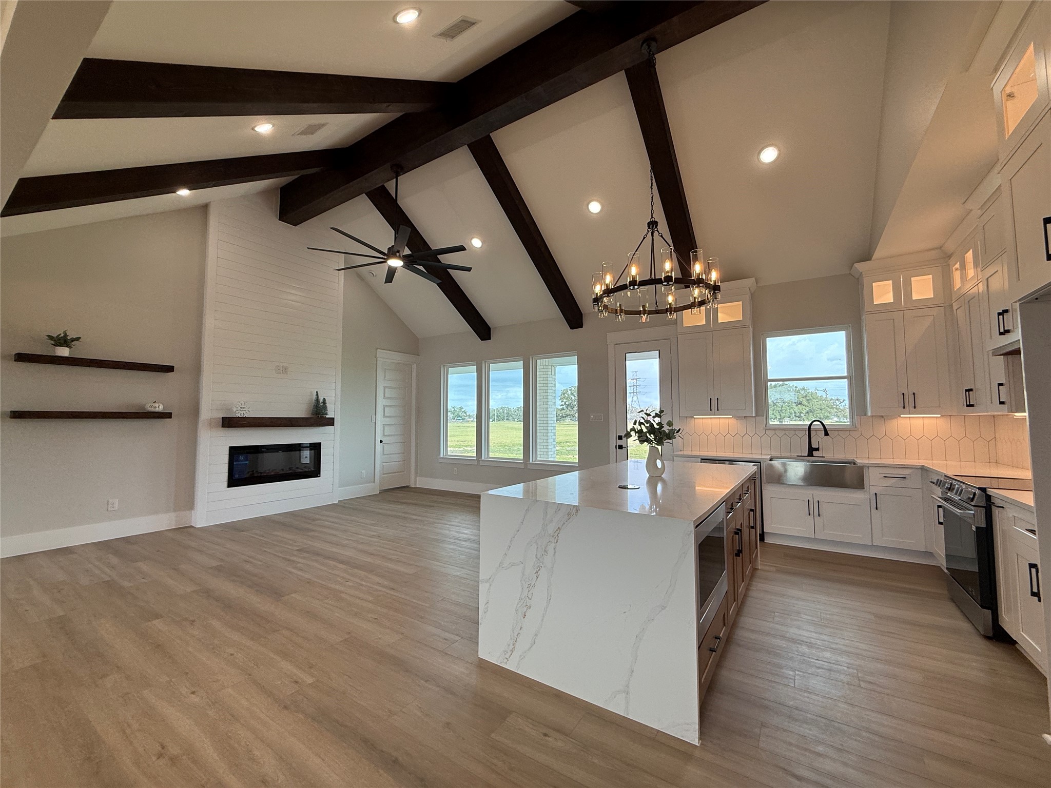 1208 Quarter Horse Trail Angleton, TX 77515 - Photo 7 of 23 a kitchen with stove and cabinets