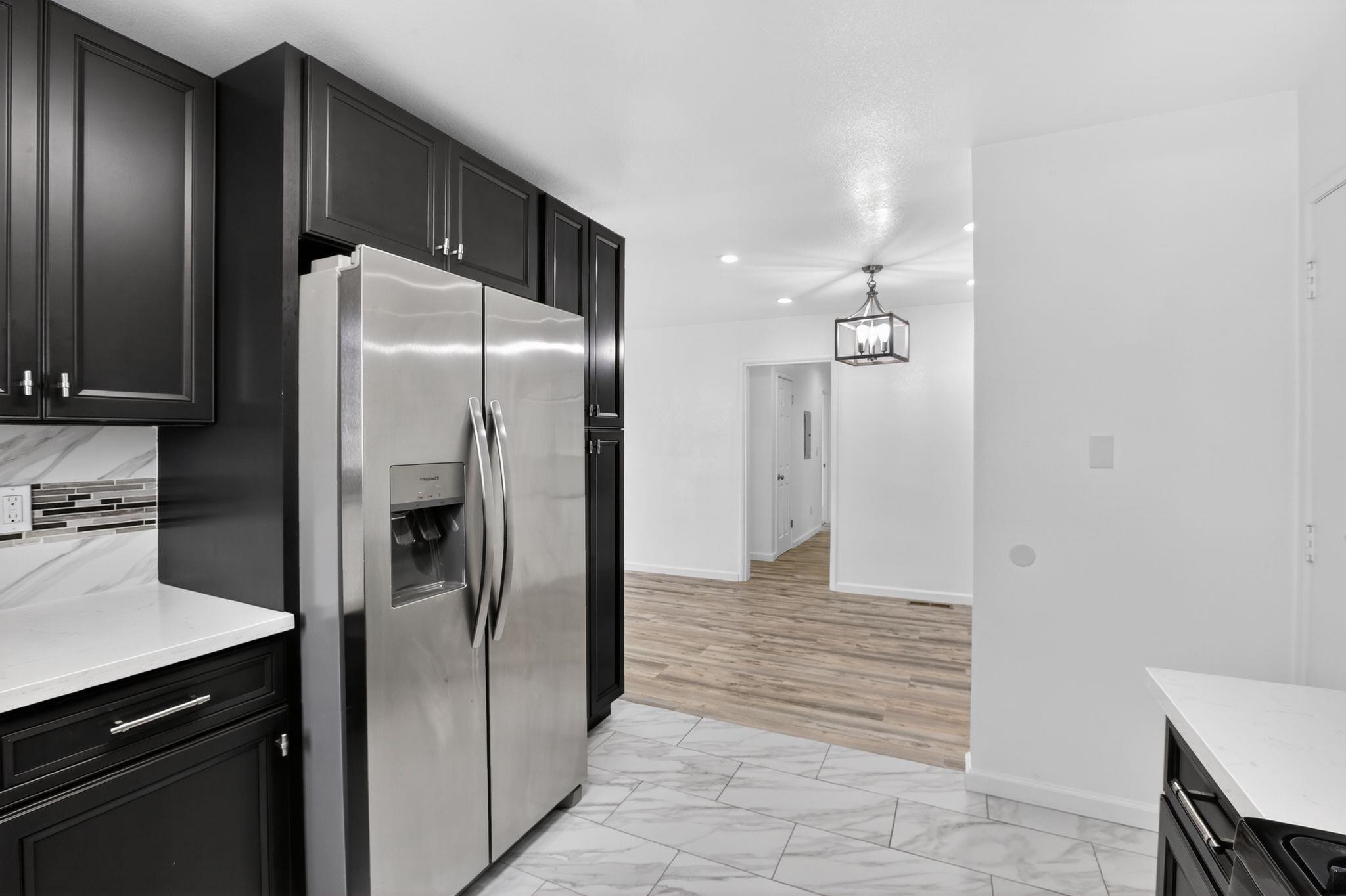 3287 Kelly Street Hayward, CA 94541 - Photo 14 of 32 a kitchen with stainless steel appliances a refrigerator and cabinets
