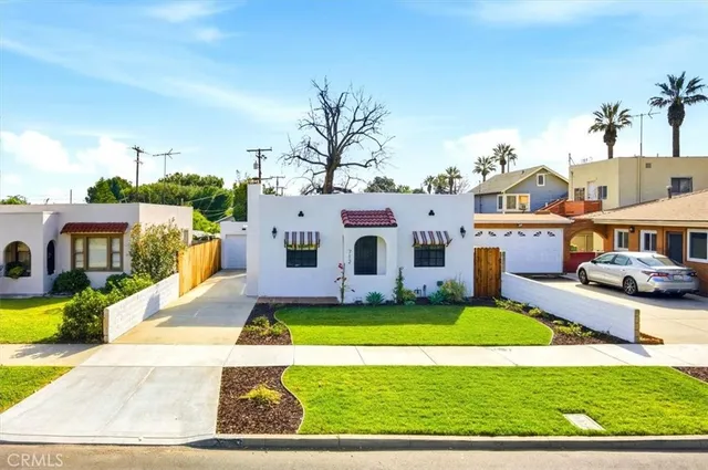 a view of a house with swimming pool