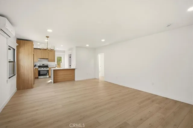 a view of kitchen with wooden floor