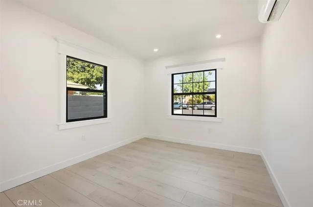 an empty room with windows