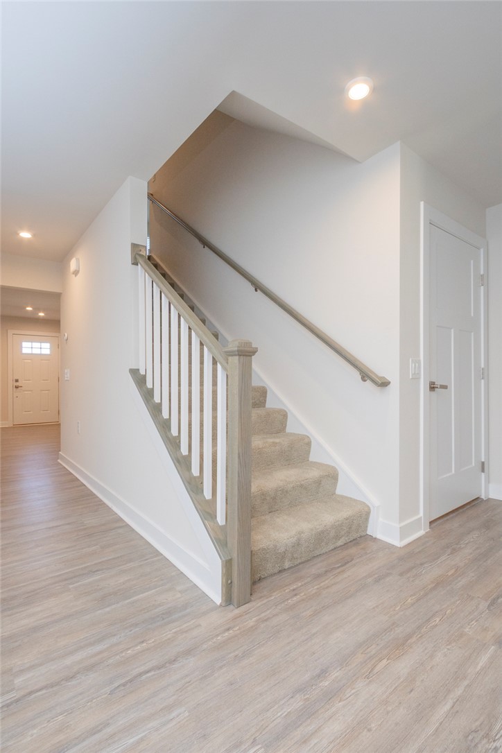 233 Scenic Road Anderson, SC 29621 - Photo 22 of 50 A well-lit entryway welcomes you with elegant stairs and resilient flooring.