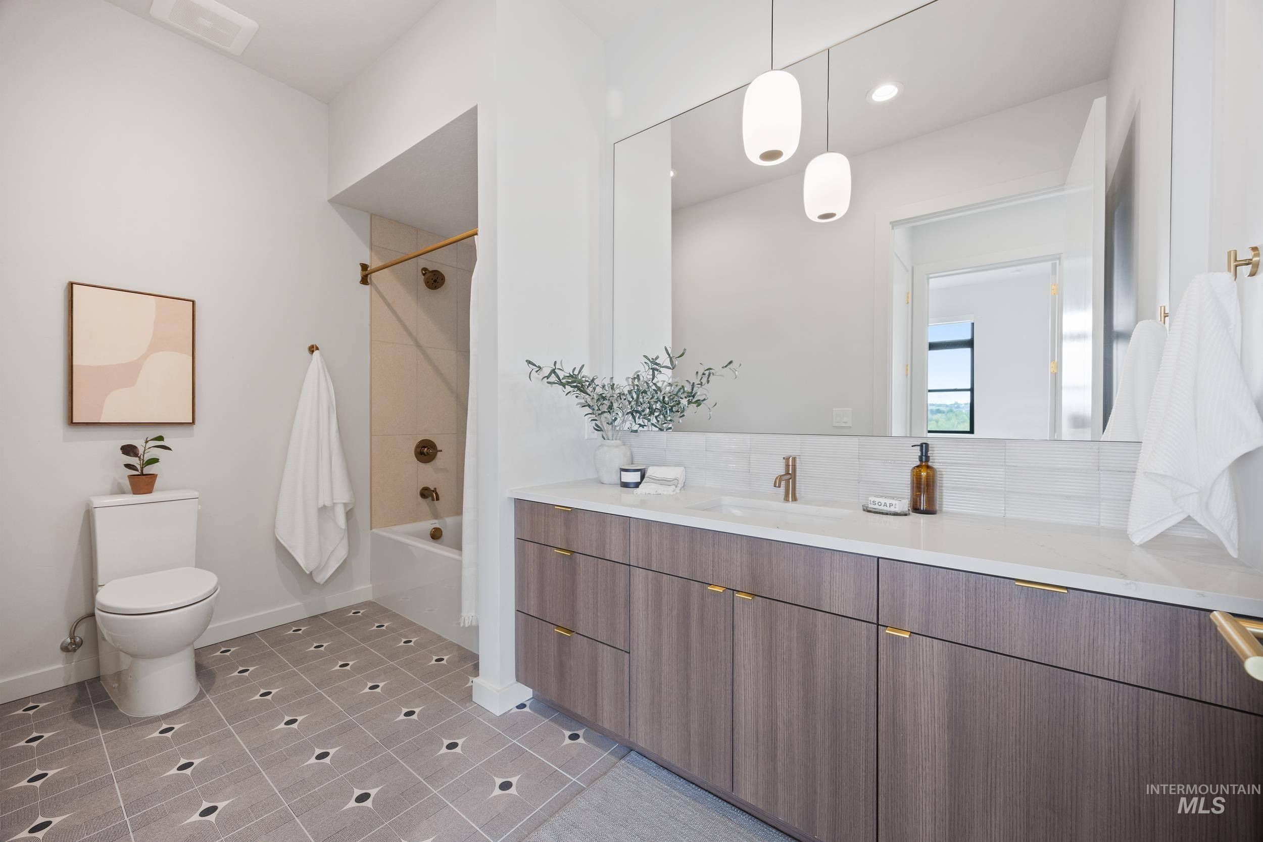 4340 East Haystack Street, Unit 305 Boise, ID 83716 - Photo 14 of 50 Bathroom with shower combination, vanity, light tile patterned flooring, and recessed lighting