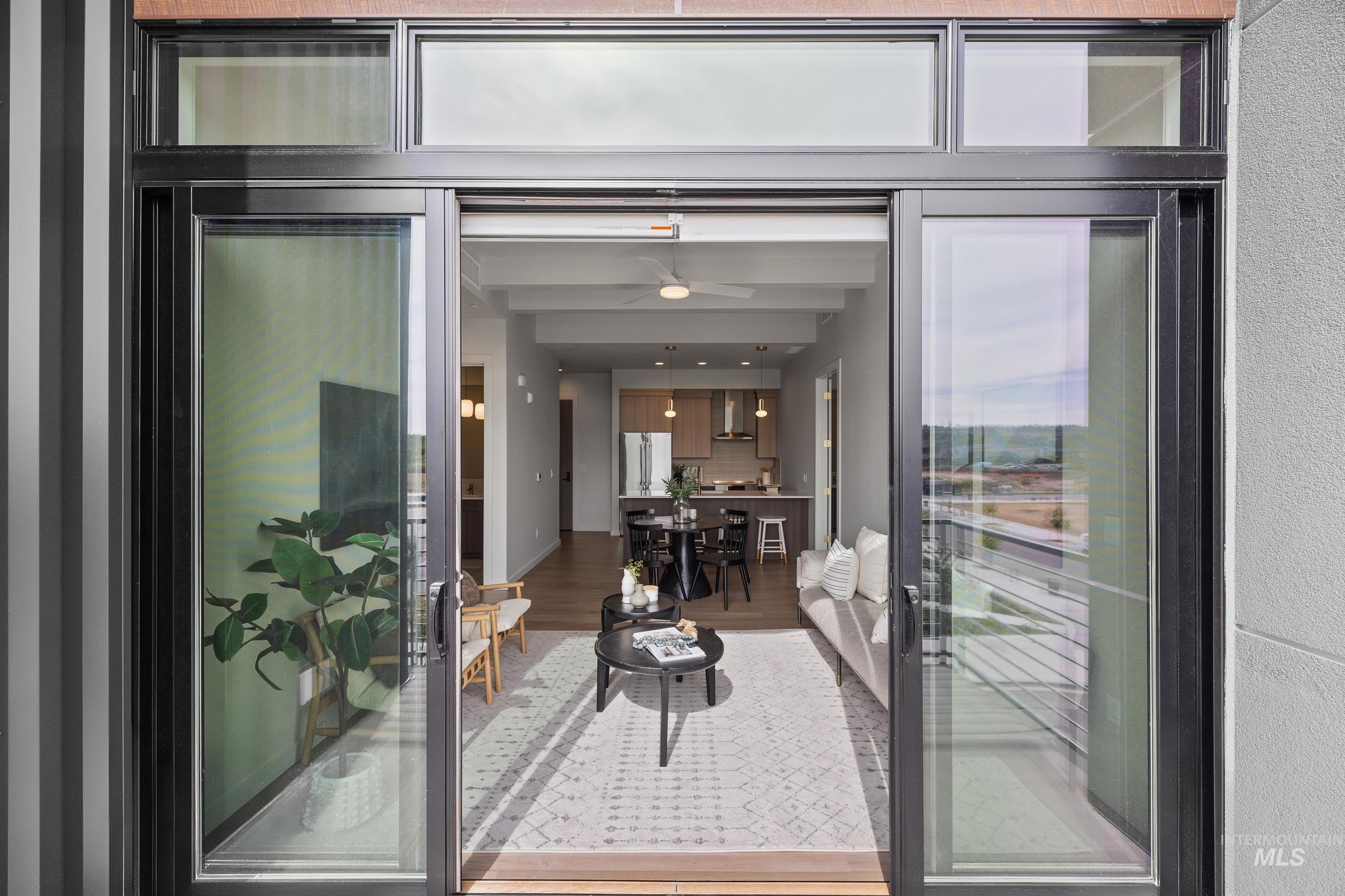 4340 East Haystack Street, Unit 305 Boise, ID 83716 - Photo 2 of 50 Interior space with wood finished floors and ceiling fan