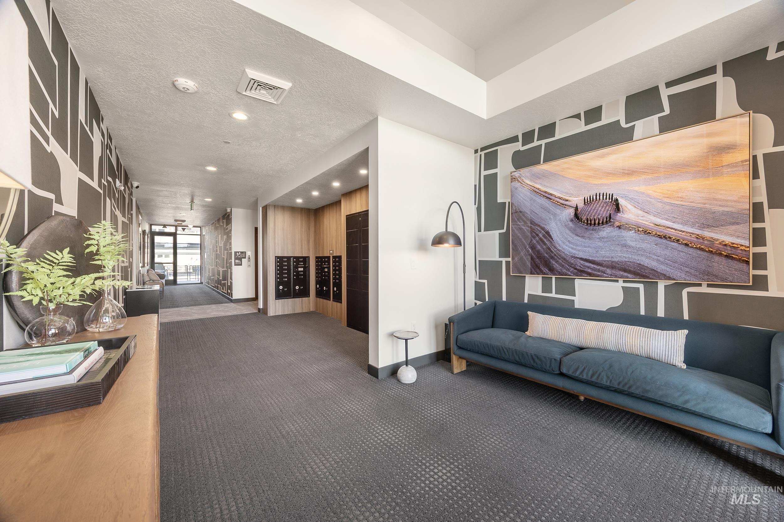 4340 East Haystack Street, Unit 305 Boise, ID 83716 - Photo 42 of 50 Building lobby featuring a textured ceiling and recessed lighting