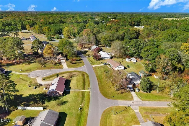 a view of a swimming pool and lounge chair