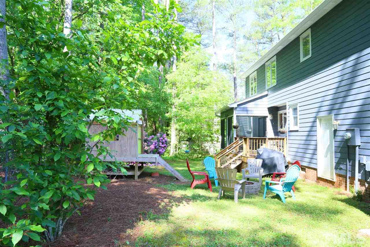 321 Bentpine Drive Raleigh, NC 27603 - Photo 18 of 30 a view of a chair and table in backyard of the house