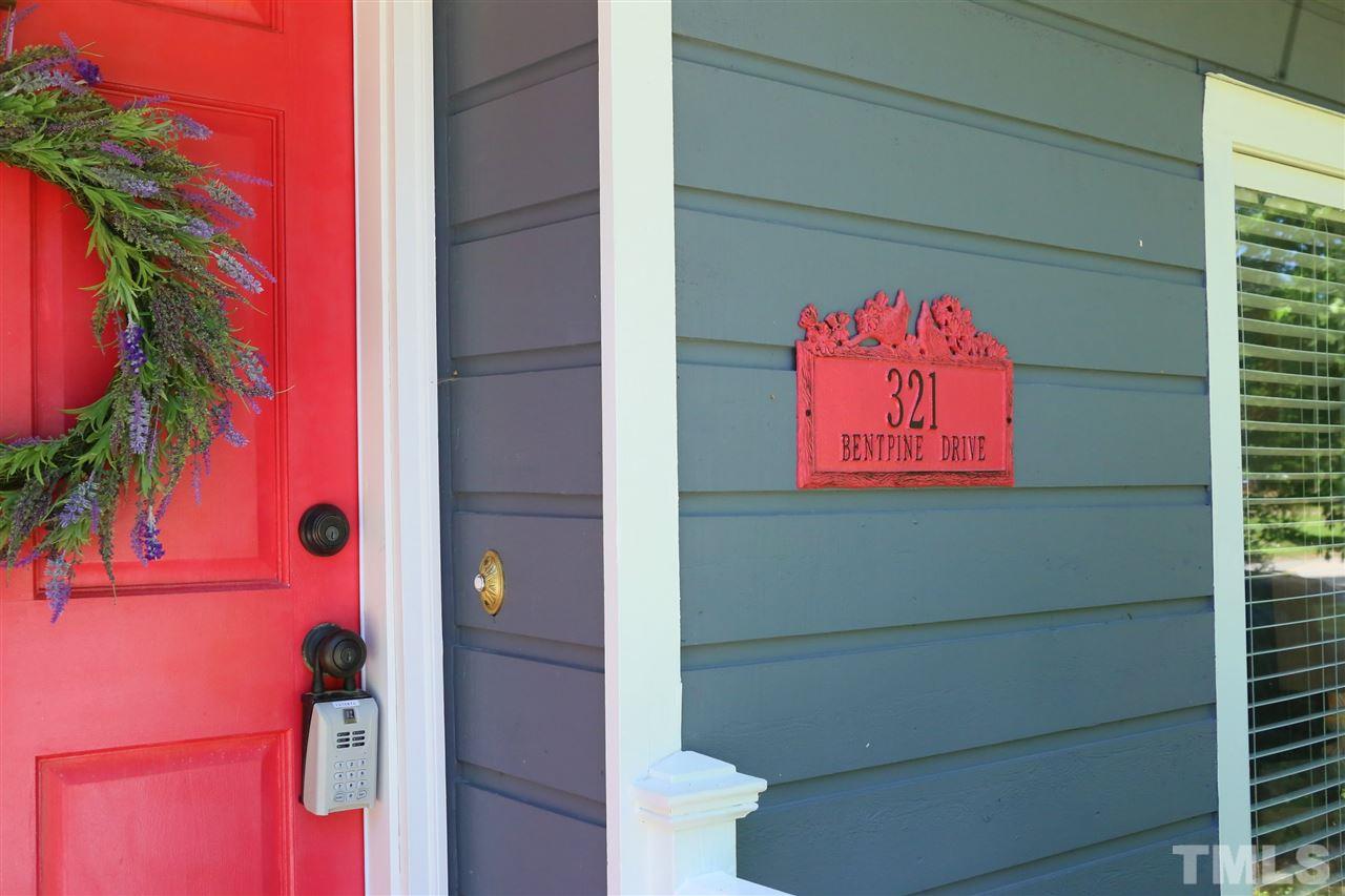 321 Bentpine Drive Raleigh, NC 27603 - Photo 3 of 30 a view of a door and a window