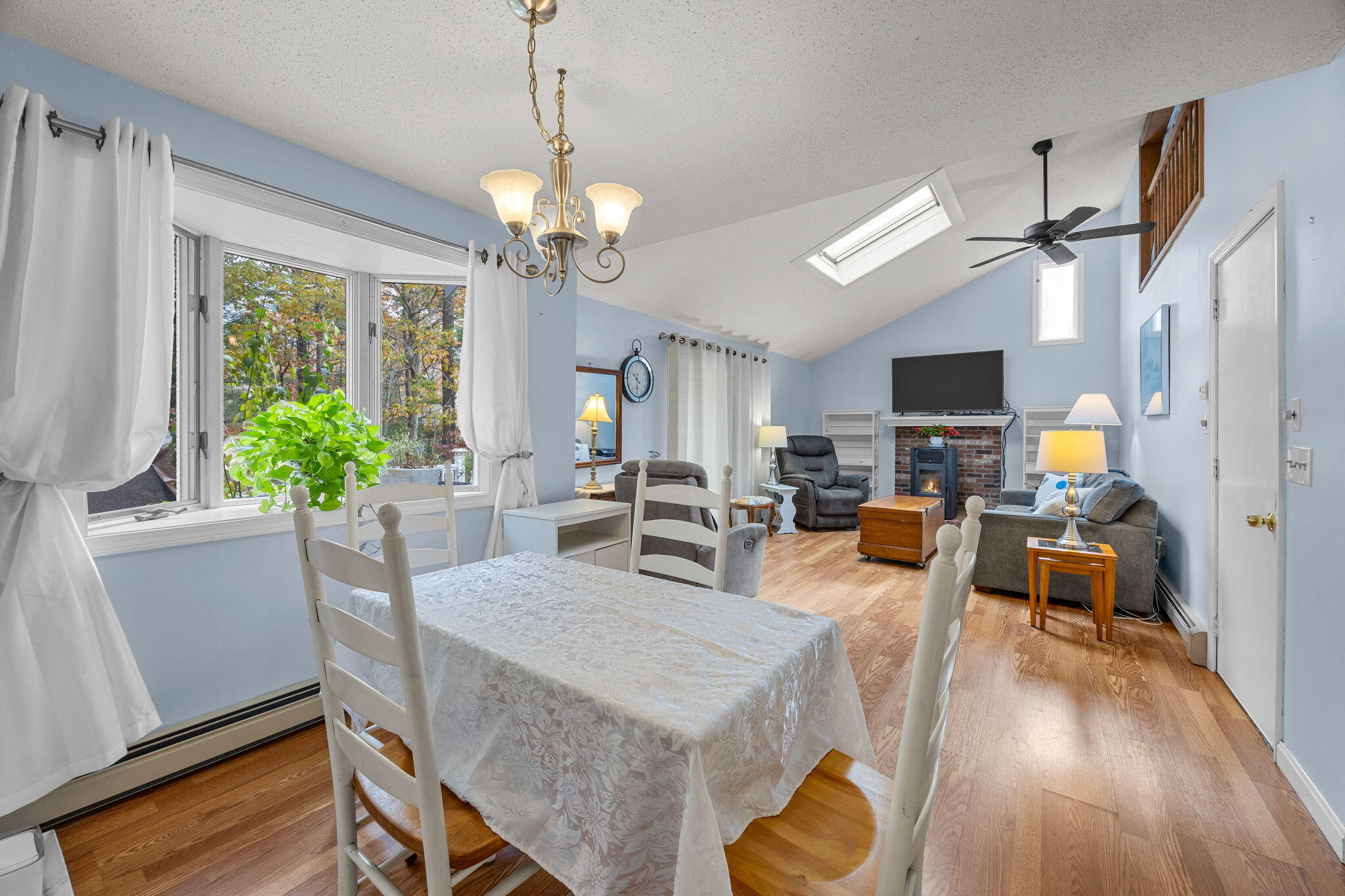 12 Beachwood Road Bourne, MA 02532 - Photo 15 of 64 a view of a dining room with furniture window and wooden floor