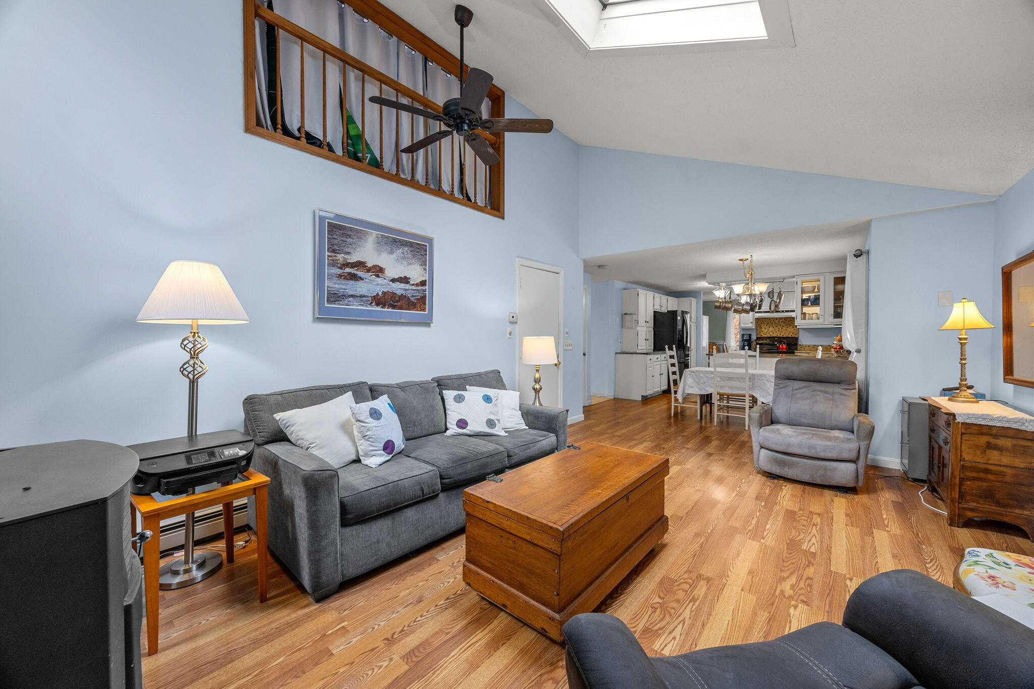 12 Beachwood Road Bourne, MA 02532 - Photo 26 of 64 a living room with furniture a lamp and a window
