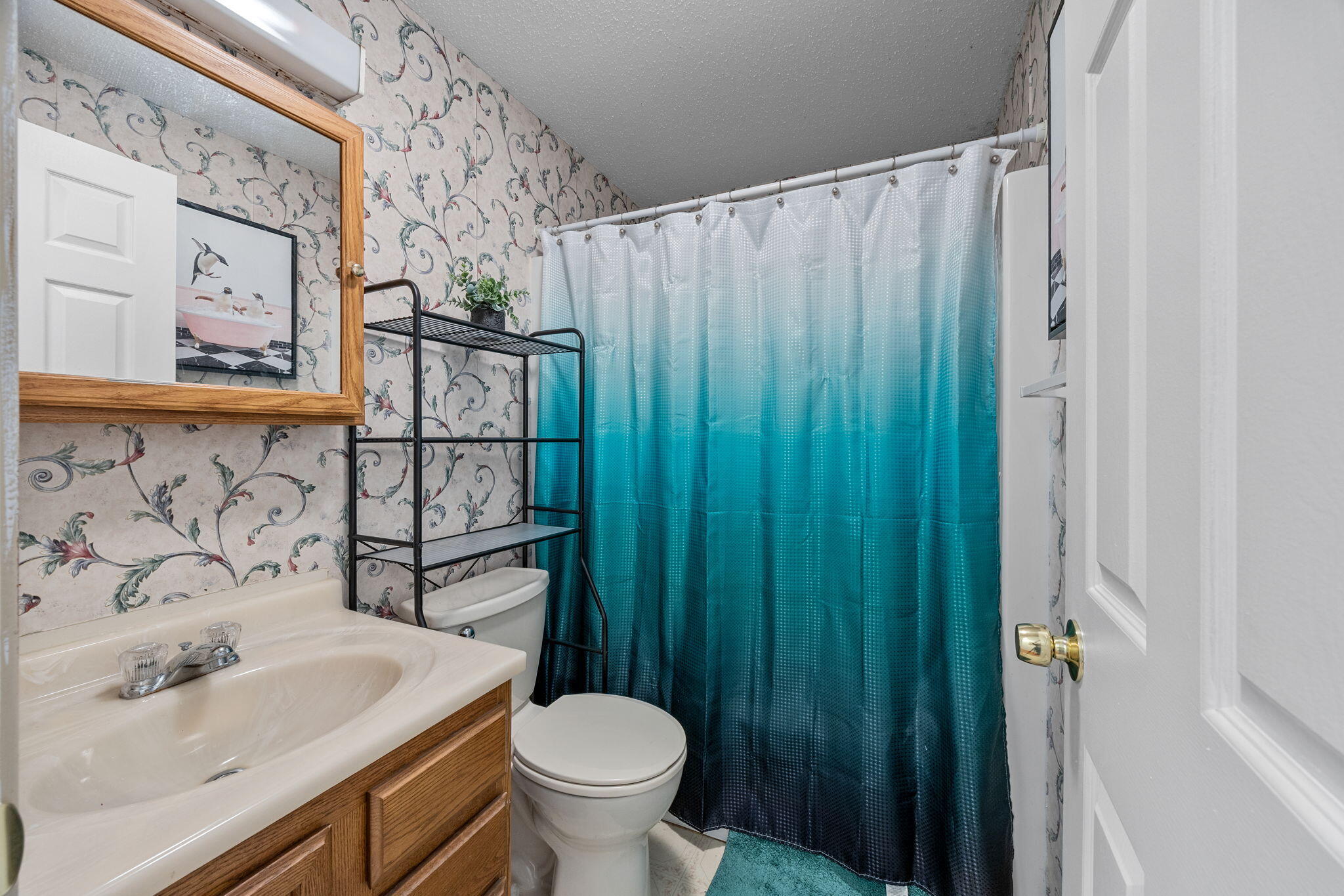 12 Beachwood Road Bourne, MA 02532 - Photo 32 of 64 a bathroom with a sink toilet and shower