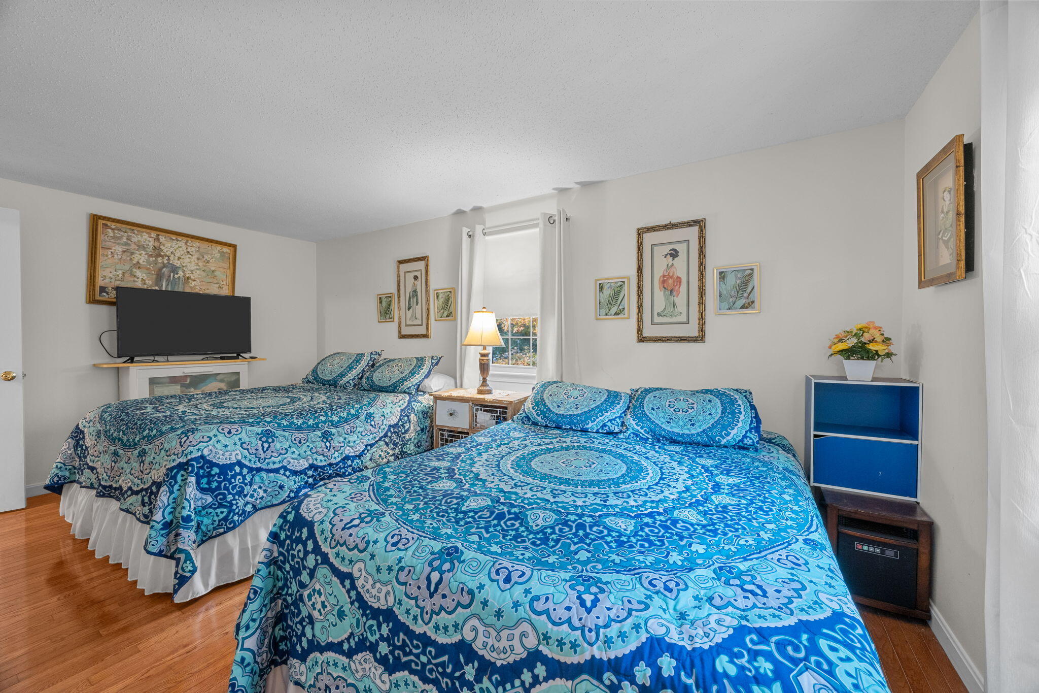 12 Beachwood Road Bourne, MA 02532 - Photo 36 of 64 a living room with furniture and a flat screen tv