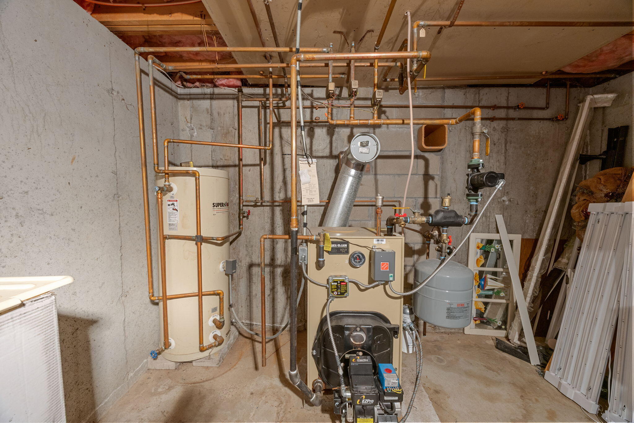 12 Beachwood Road Bourne, MA 02532 - Photo 39 of 64 a view of a storage room with utility room