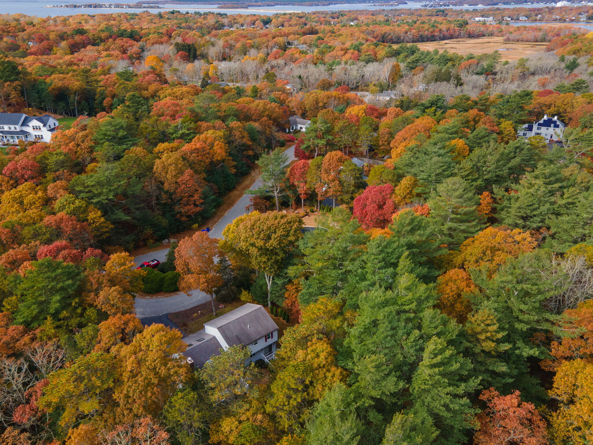 12 Beachwood Road Bourne, MA 02532 - Photo 48 of 64 an aerial view of residential houses with outdoor space and trees