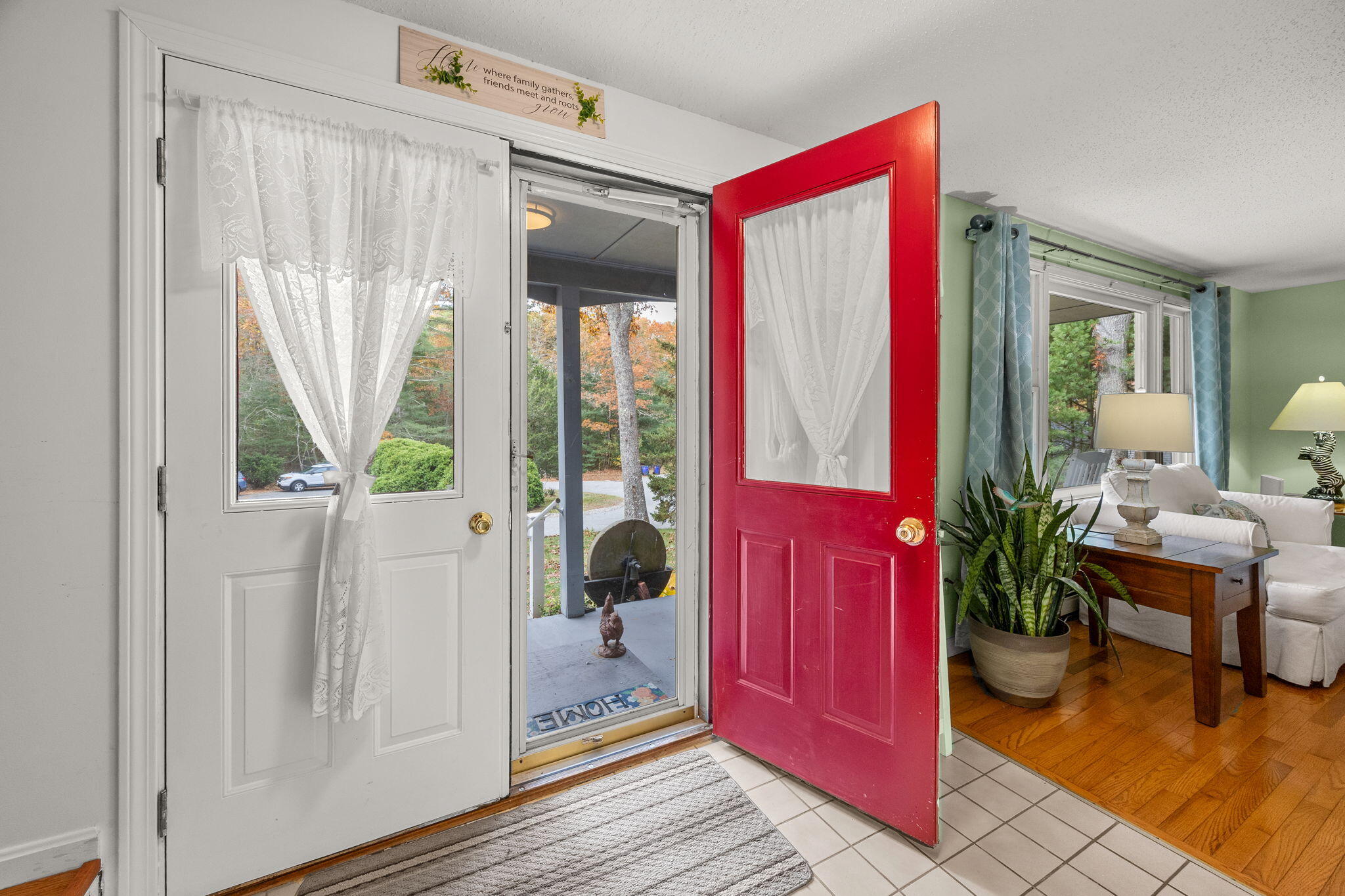 12 Beachwood Road Bourne, MA 02532 - Photo 9 of 64 a very nice looking room with a large window and a rug