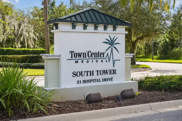 a view of a swimming pool with a garden