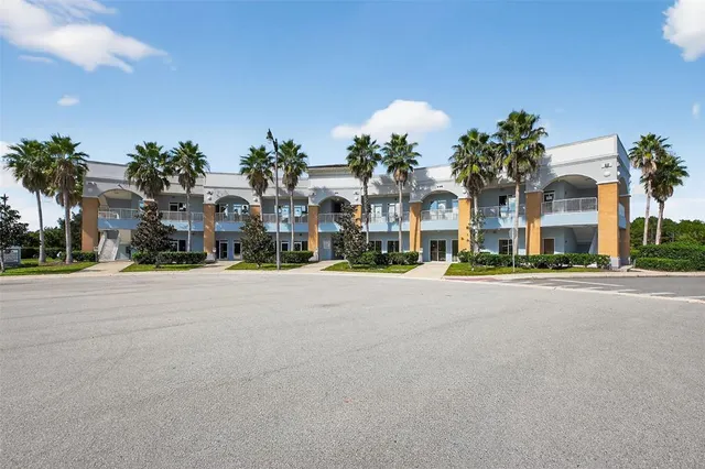 a front view of a building with garden
