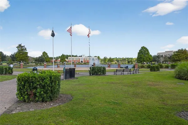a view of a building with a yard