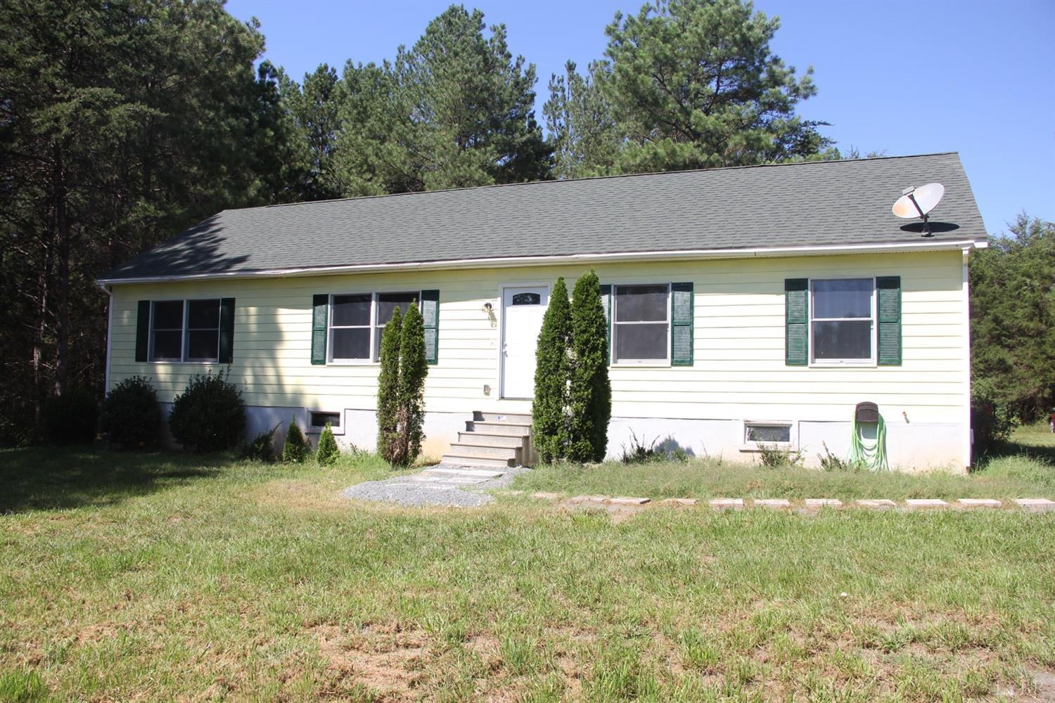 792 Fletchers Level Road Amherst, VA 24521 - Photo 1 of 40 a backyard of a house with yard and outdoor seating