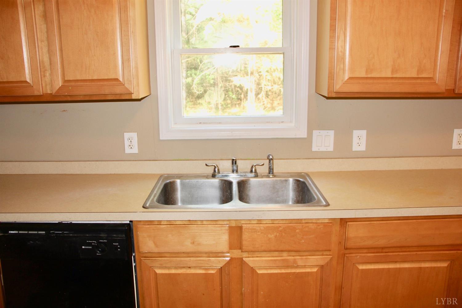 792 Fletchers Level Road Amherst, VA 24521 - Photo 11 of 40 a bathroom with a sink and a window