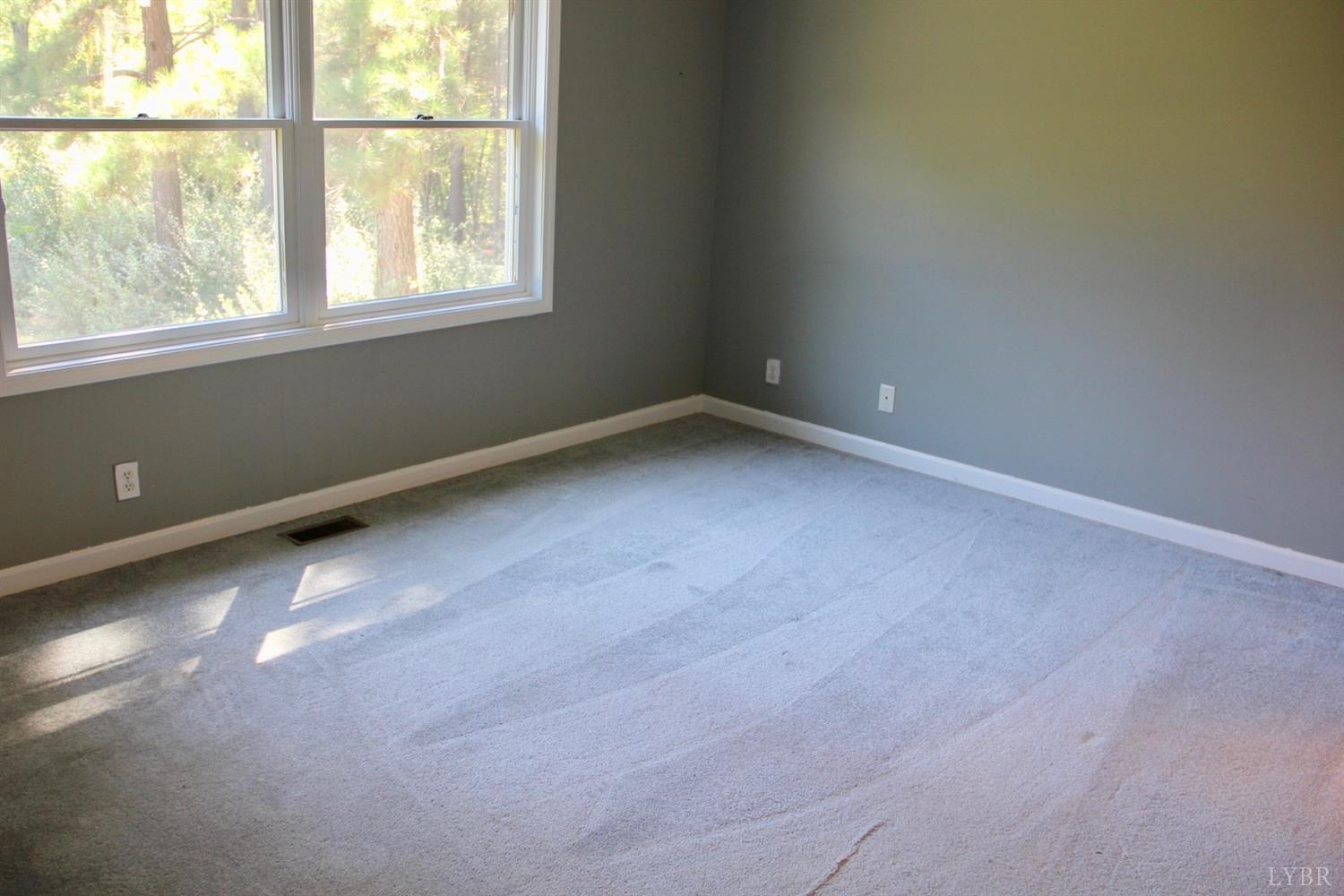 792 Fletchers Level Road Amherst, VA 24521 - Photo 16 of 40 an empty room with a window