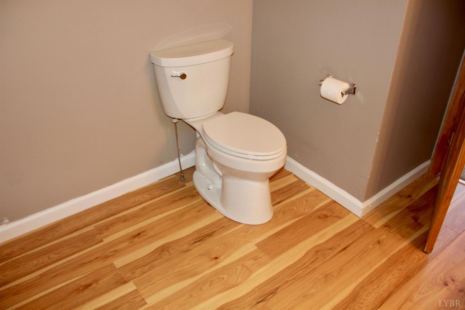 792 Fletchers Level Road Amherst, VA 24521 - Photo 19 of 40 a bathroom with a toilet and a sink
