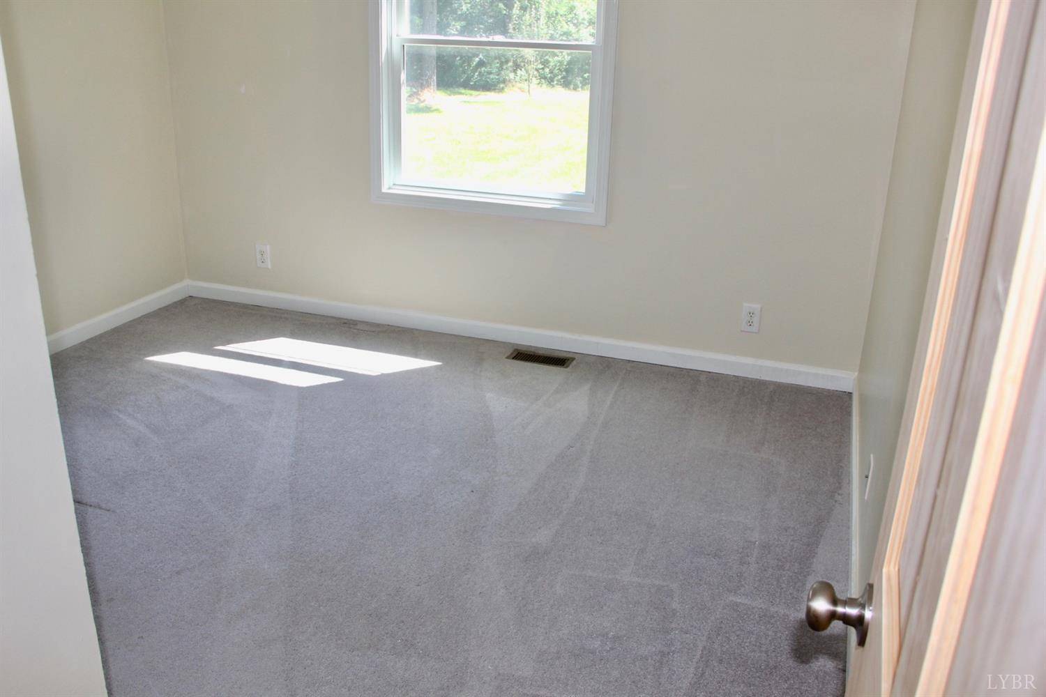 792 Fletchers Level Road Amherst, VA 24521 - Photo 21 of 40 a view of empty room with window