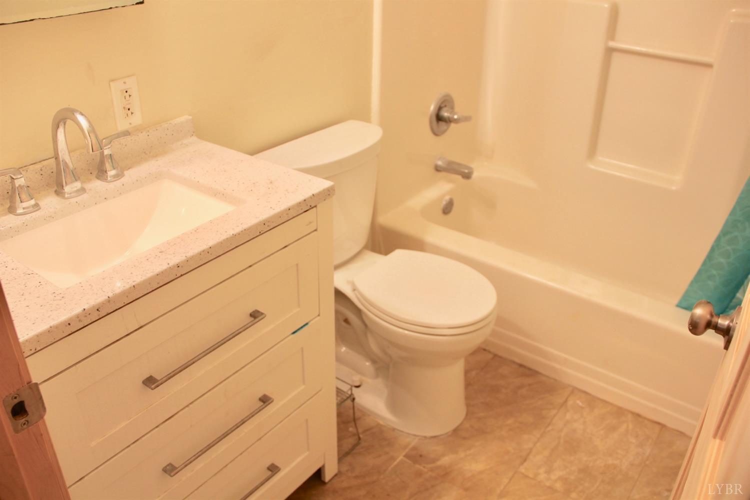 792 Fletchers Level Road Amherst, VA 24521 - Photo 23 of 40 a bathroom with a toilet and a sink