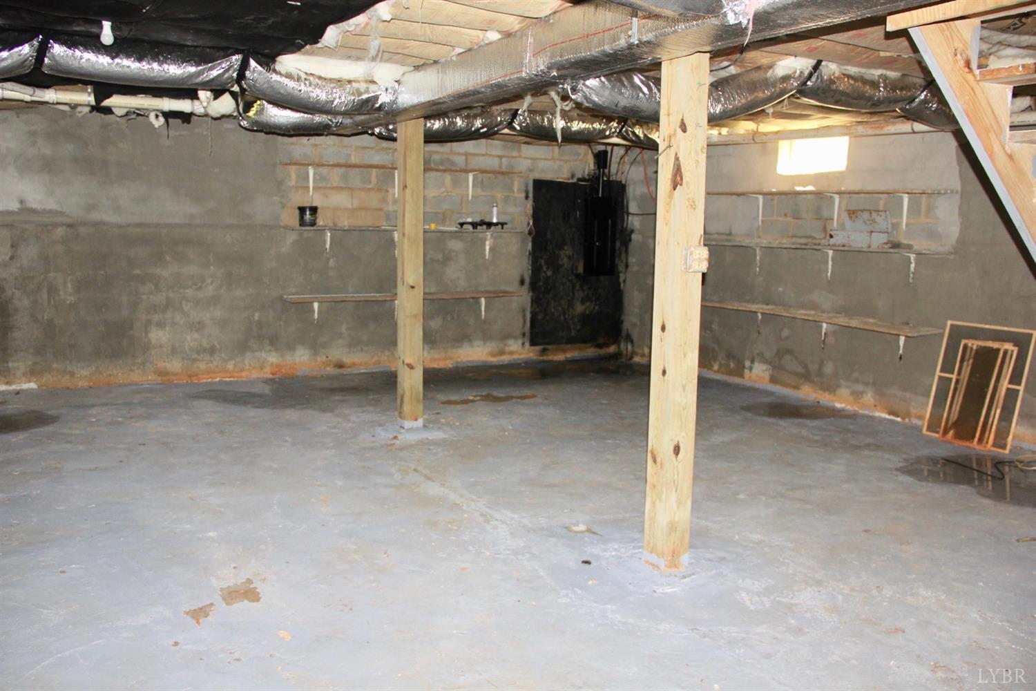 792 Fletchers Level Road Amherst, VA 24521 - Photo 30 of 40 a view of a room with racks on the wall