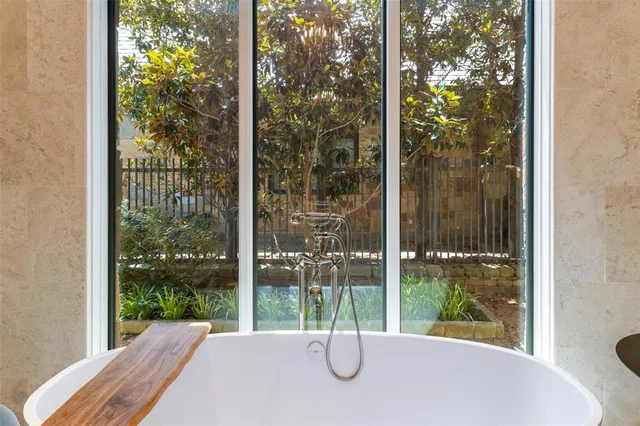 a view of a glass door and balcony