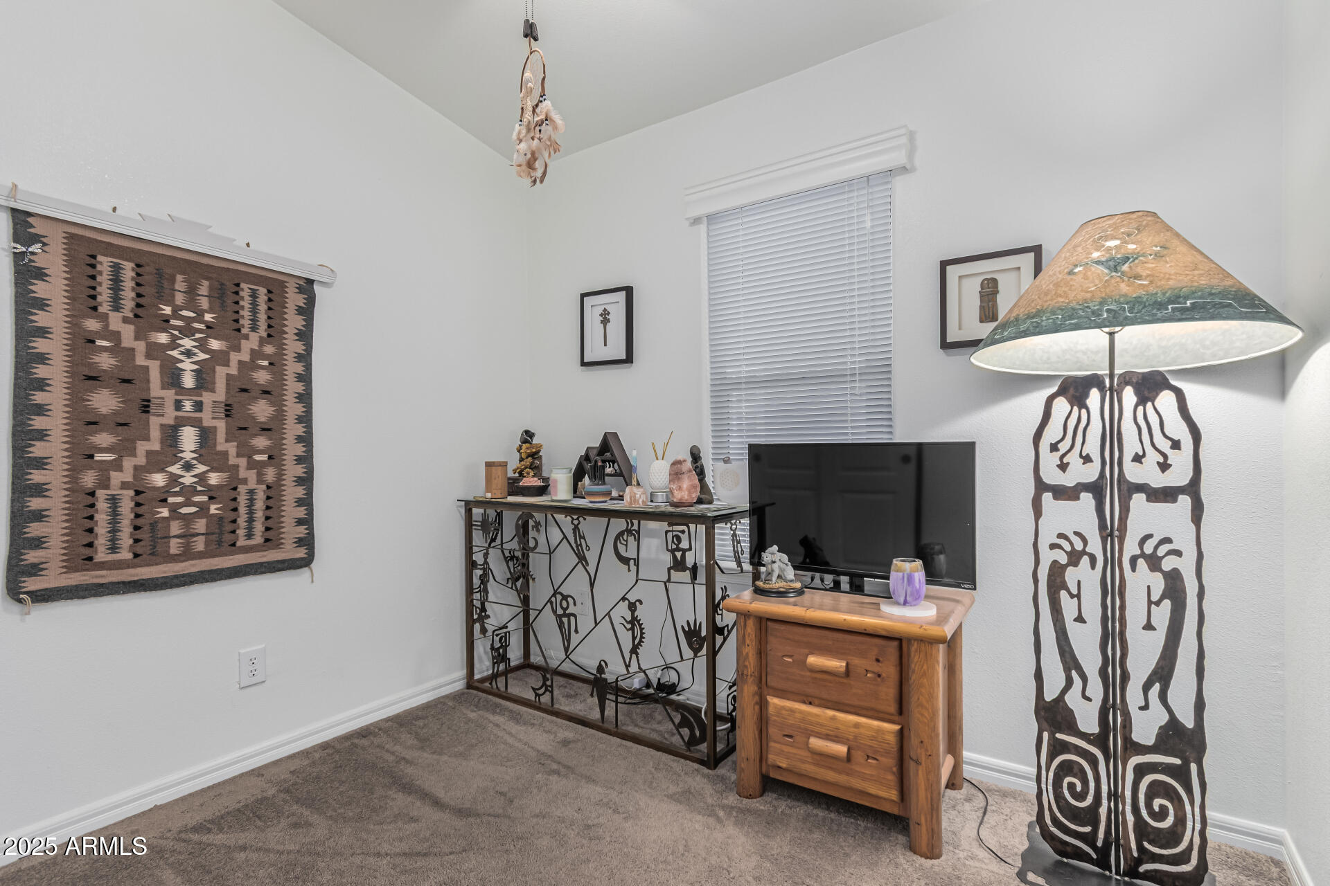650 North Hawes Road, Unit 3815 Mesa, AZ 85207 - Photo 24 of 29 a view of room with furniture and a flat screen tv