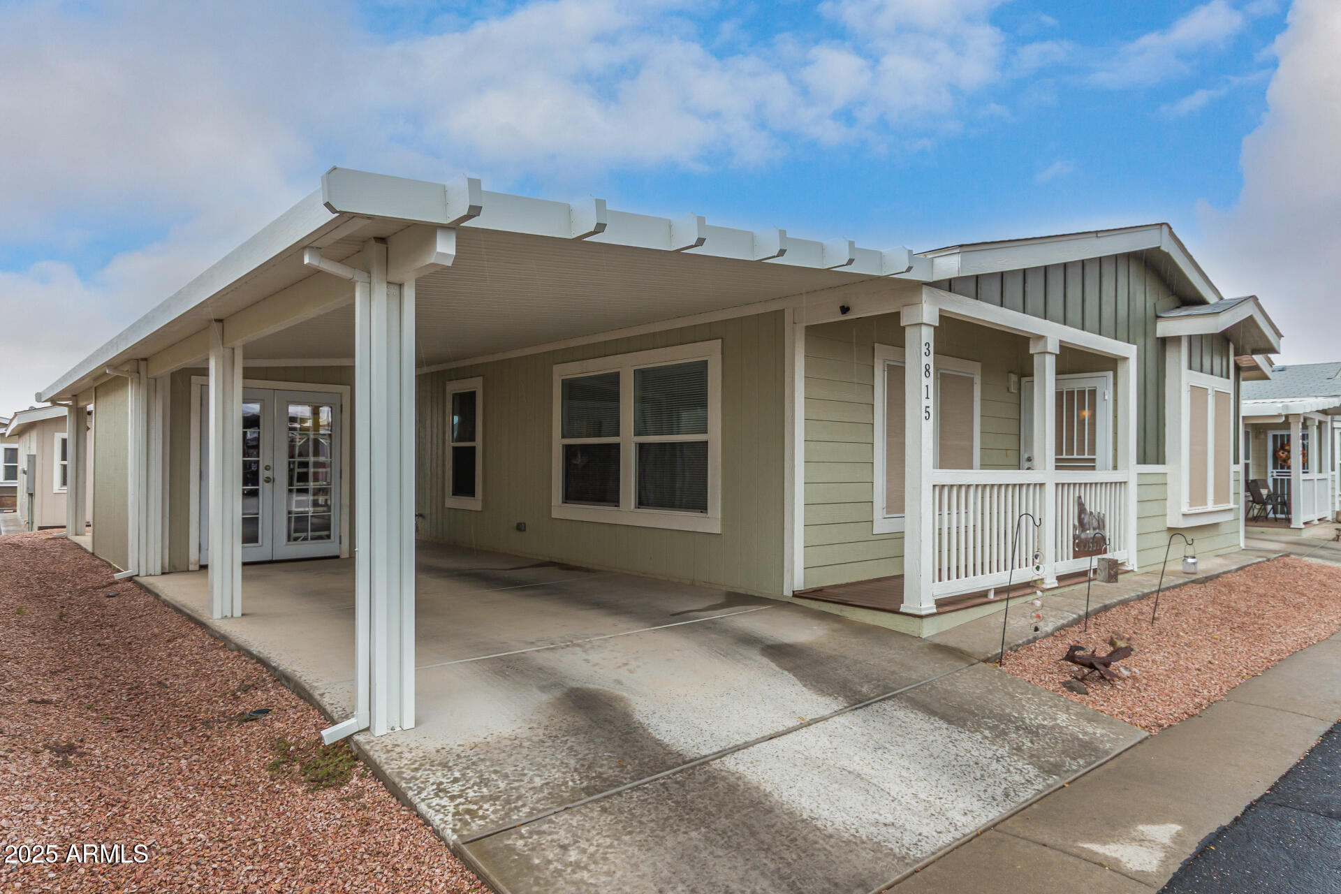 650 North Hawes Road, Unit 3815 Mesa, AZ 85207 - Photo 6 of 29 front view of a house with a porch