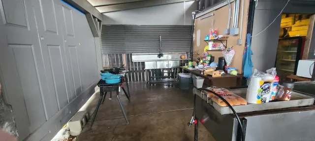 a view of a tables and chairs in a balcony