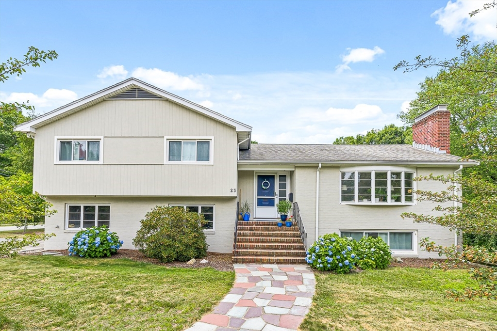 23 Cottonwood Road Wellesley, MA 02482 - Photo 1 of 19 a front view of a house with a yard