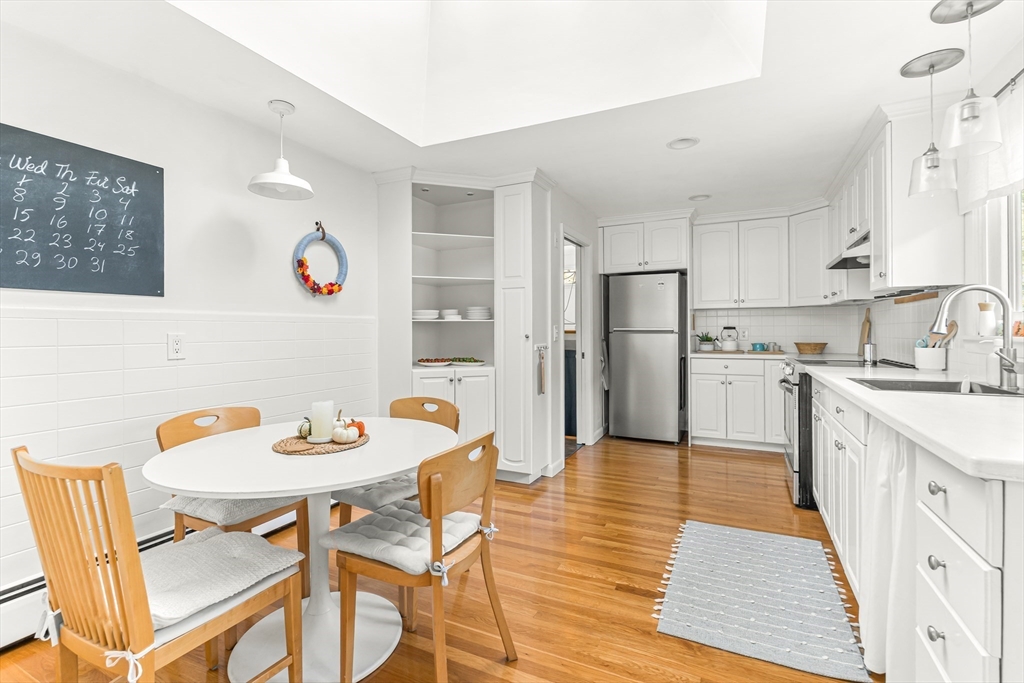 23 Cottonwood Road Wellesley, MA 02482 - Photo 8 of 19 a view of kitchen with refrigerator and wooden floor