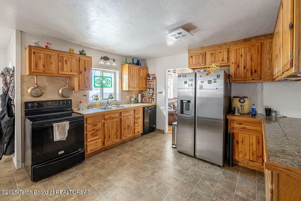$490,000 | 91008 Highway 89, Grover, WY 83122