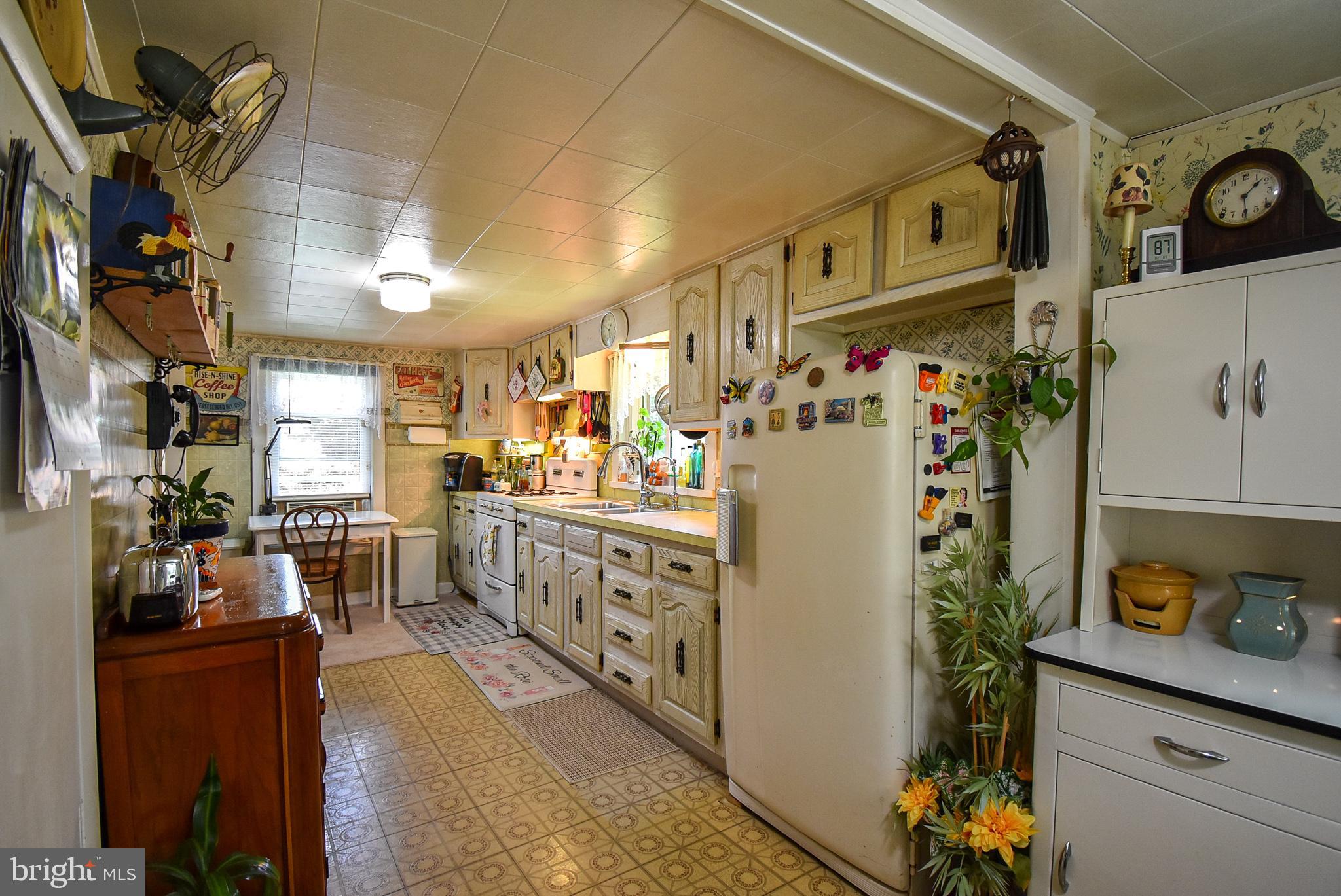 740 County Line Road Gap, PA 17527 - Photo 5 of 38 a kitchen with refrigerator and window