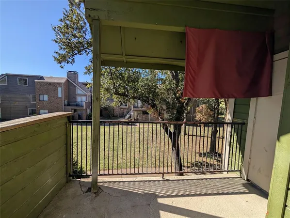 a view of a house with a street