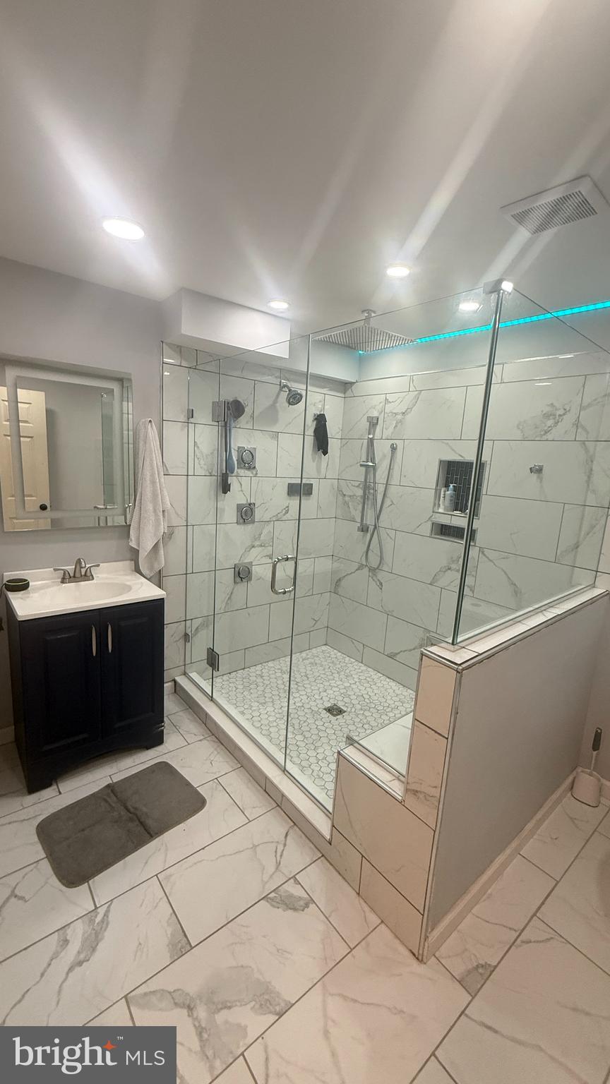 11 Hunters Forge Court Owings Mills, MD 21117 - Photo 111 of 139 a bathroom with a tub sink and shower