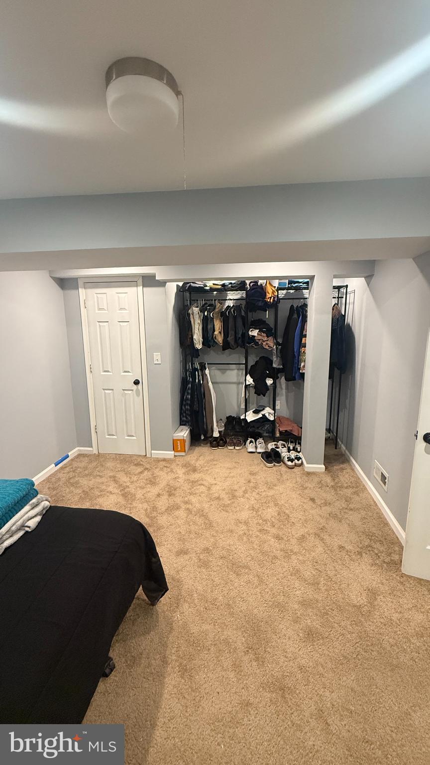 11 Hunters Forge Court Owings Mills, MD 21117 - Photo 135 of 139 a bed room with a bed and a chair