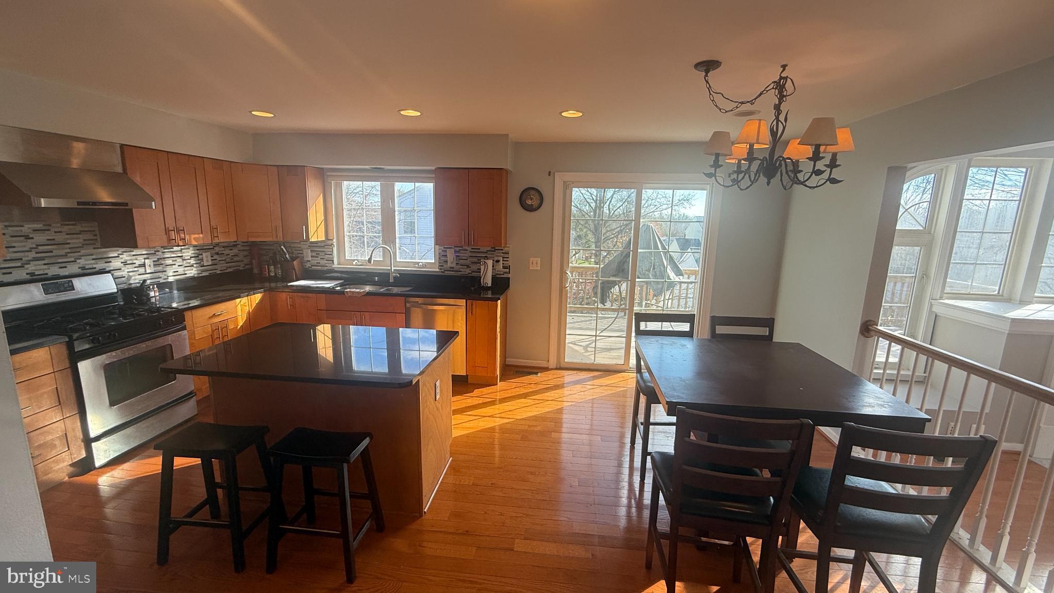 11 Hunters Forge Court Owings Mills, MD 21117 - Photo 22 of 139 a view of a dining room with furniture window and wooden floor