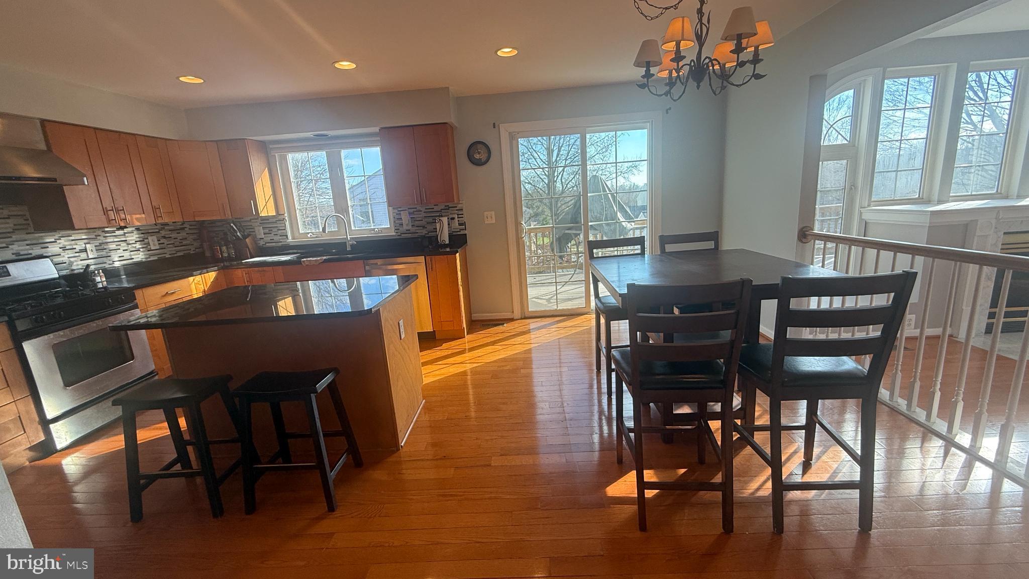11 Hunters Forge Court Owings Mills, MD 21117 - Photo 23 of 139 a view of a dining room with furniture window and wooden floor