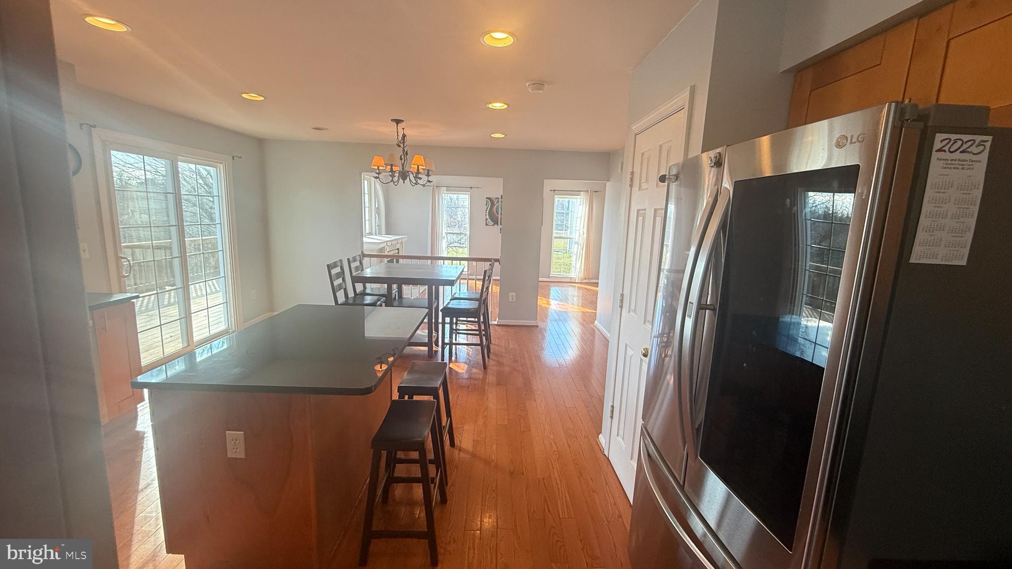11 Hunters Forge Court Owings Mills, MD 21117 - Photo 27 of 139 a kitchen with stainless steel appliances granite countertop a refrigerator and a table
