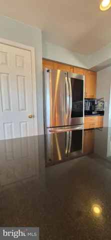 a bathroom with a sink double vanity and a mirror