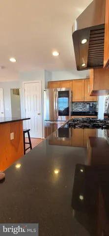 a bathroom with a sink double vanity and a mirror