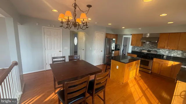 a spacious bathroom with a bathtub and a shower